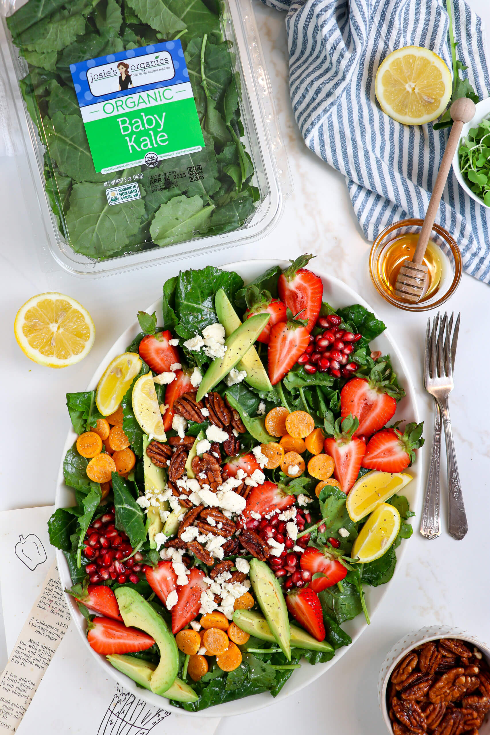Baby Kale Salad with Golden Berries, Goat Cheese, & Candies Pecans